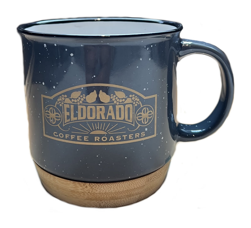 Eldorado Coffee Roasters mug showcases a speckled blue finish and a bamboo base.