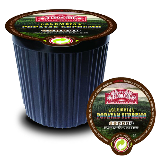 A black single-serve cup of Eldorado Roasters Colombian Popayan Supremo coffee displays the brand's logo and flavor details.