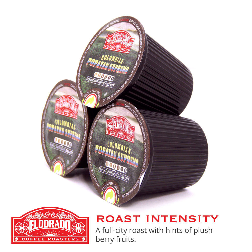 Three Eldorado Coffee Roasters Colombian Popayan Supremo single-serve coffee pods stacked on top of each other.