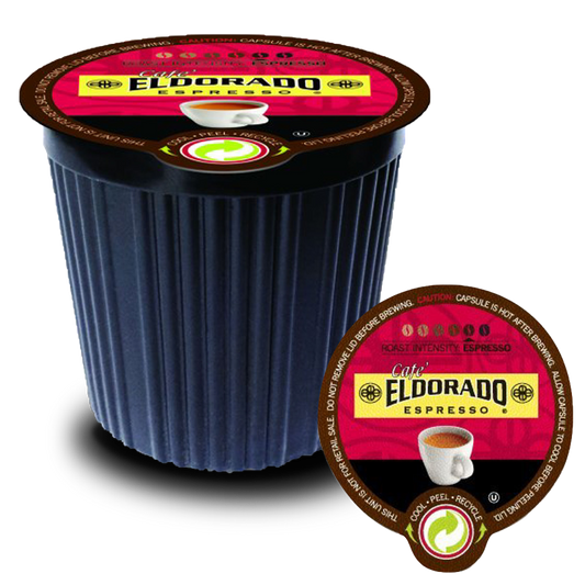 A single-serve Cafe Eldorado espresso capsule sits on its lid, showcasing the dark roast intensity and promising a rich coffee experience.