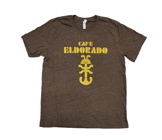 Brown t-shirt featuring a bold "Cafe Eldorado" graphic in gold lettering with a stylized sun symbol beneath.