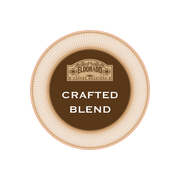 Eldorado Coffee Roasters' Crafted Blend logo features a brown circle with an intricate pattern, highlighting the brand name and "Crafted Blend" in a vintage-inspired font. 
