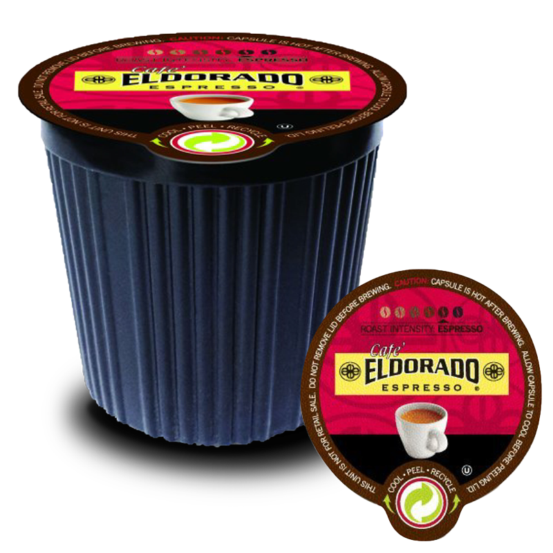 A single-serve Cafe Eldorado espresso capsule sits on its lid, showcasing the dark roast intensity and promising a rich coffee experience. 
