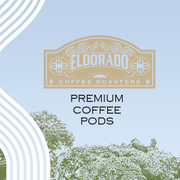 Eldorado Coffee Roasters logo above the words "Premium Coffee Pods" against a backdrop of a stylized coffee plantation. 
